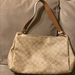 Gold and cream Coach purse
